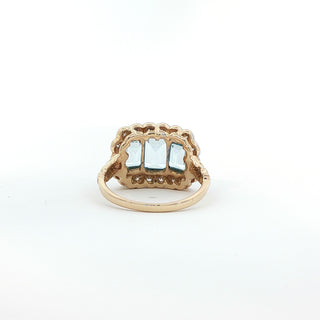 9KT YELLOW GOLD SKY BLUE TOPAZ DIAMOND RING