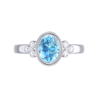 9 Kt White Gold Sky Blue Topaz and Diamond Ring