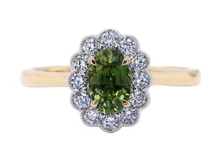 18KT WYG GREEN SAPPHIRE AND DIAMOND RING