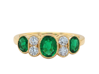 18KT YG EMERALD AND DIAMOND RING