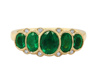 18KT YG EMERALD AND DIAMOND RING