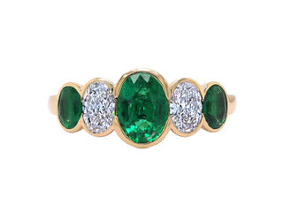 18KT WYG EMERALD AND DIAMOND RING