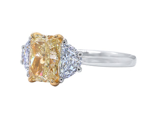 PLATINUM + 18KT YELLOW DIAMOND RING .
