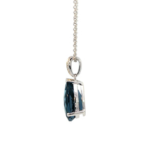 9KT WHITE & YELLOW GOLD LONDON BLUE TOPAZ DIAMOND PENDANT