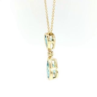 9KT YELLOW GOLD BLUE TOPAZ PENDANT