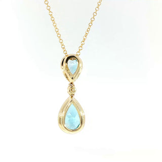 9KT YELLOW GOLD BLUE TOPAZ PENDANT