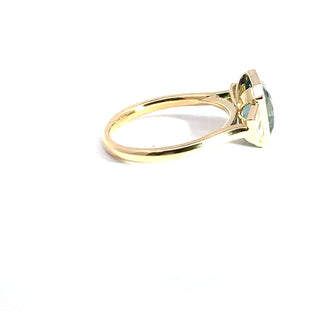 18KT YELLOW GOLD TEAL SAPPHIRE AND DIAMOND RING