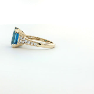9KT YELLOW GOLD BLUE TOPAZ DIAMOND RING
