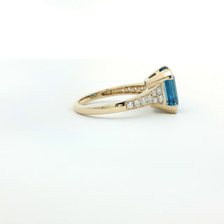 9KT YELLOW GOLD BLUE TOPAZ DIAMOND RING